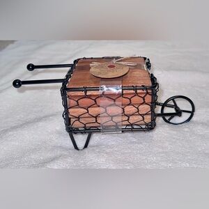 NWT miniature metal wheelbarrow with set of 4 wooden coasters.